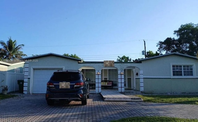 7745 Harbour Blvd, Miramar, FL 33023 - single story home with an attached garage, driveway, and stucco siding