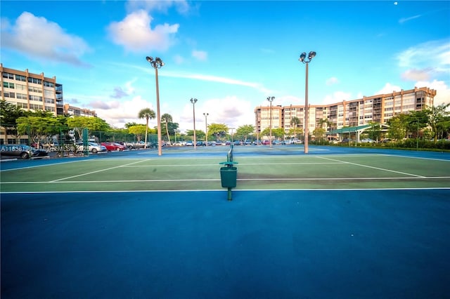 1300 Saint Charles Pl Unit 613, Pembroke Pines, FL 33026 - view of tennis court featuring community basketball court