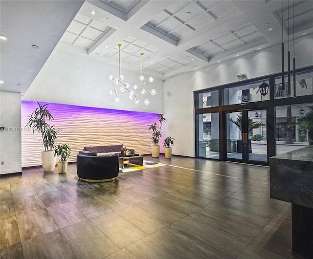 10 Aragon Ave Unit 1118, Coral Gables, FL 33134 - community lobby with a high ceiling, coffered ceiling, and beamed ceiling