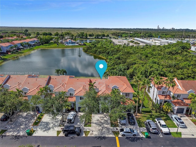 14815 SW 9th Ln, Miami, FL 33194 - aerial view of residential area featuring a nearby body of water and a tree filled landscape