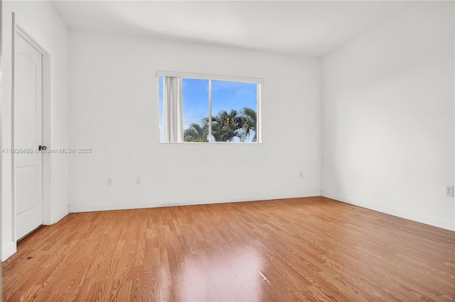 14815 SW 9th Ln, Miami, FL 33194 - spare room featuring light wood-type flooring and baseboards