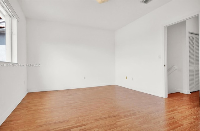 14815 SW 9th Ln, Miami, FL 33194 - empty room with light wood-style flooring