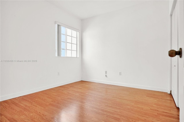 14815 SW 9th Ln, Miami, FL 33194 - unfurnished room featuring light wood finished floors