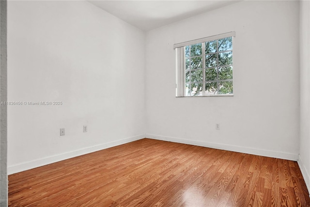 14815 SW 9th Ln, Miami, FL 33194 - spare room with wood finished floors and baseboards