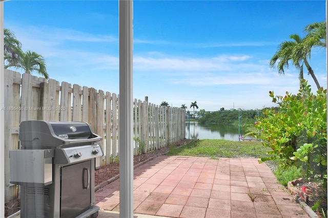 14815 SW 9th Ln, Miami, FL 33194 - view of patio / terrace featuring area for grilling and a water view