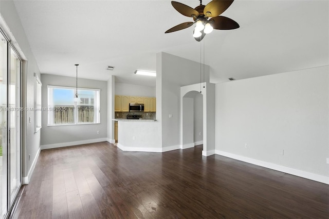 8899 NW 169th Ter, Hialeah, FL 33018 - unfurnished living room featuring ceiling fan and dark wood finished floors