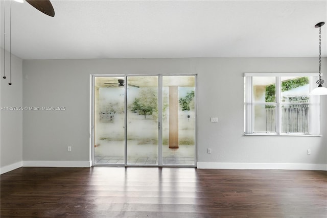 8899 NW 169th Ter, Hialeah, FL 33018 - unfurnished room with a ceiling fan and wood finished floors