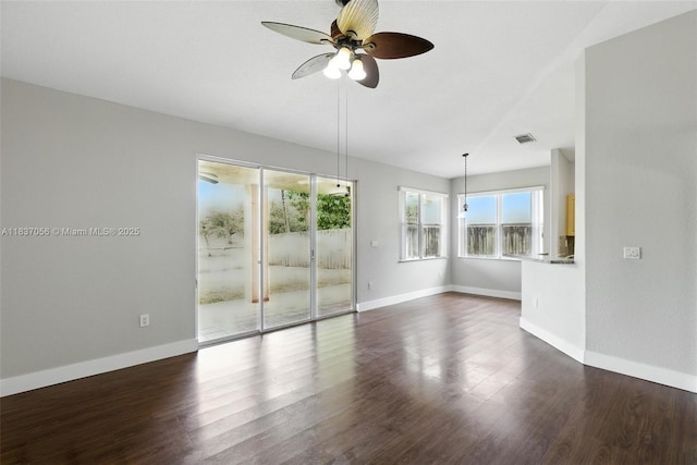 8899 NW 169th Ter, Hialeah, FL 33018 - empty room with dark wood-type flooring and a ceiling fan