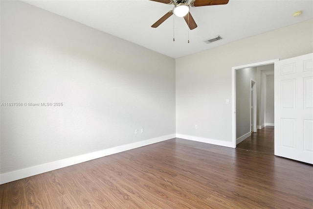 8899 NW 169th Ter, Hialeah, FL 33018 - spare room featuring a ceiling fan, dark wood-type flooring, and a smoke detector