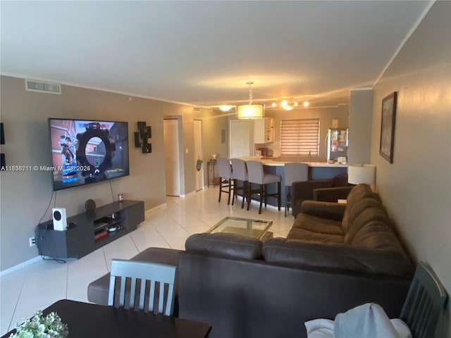 2205 S Cypress Bend Dr Unit 302, Pompano Beach, FL 33069 - living room with light tile patterned floors and baseboards