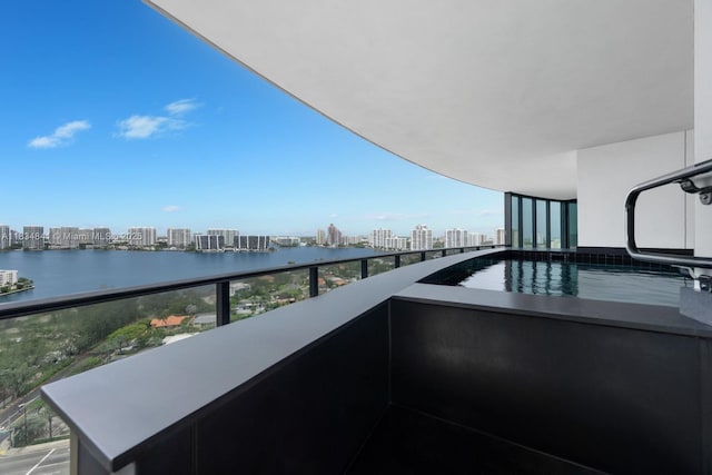18555 Collins Ave Unit 2003, Sunny Isles Beach, FL 33160 - balcony with a city view and a water view