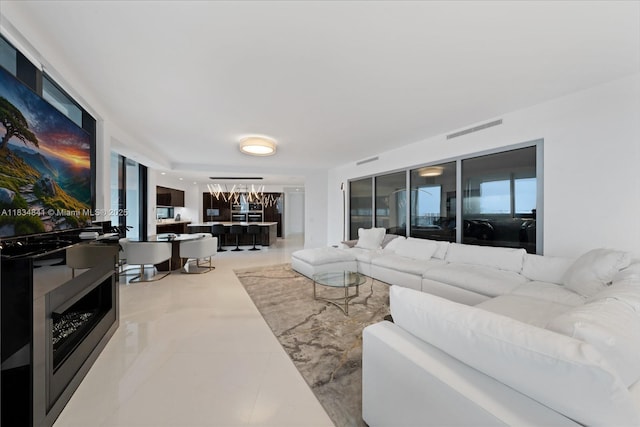 18555 Collins Ave Unit 2003, Sunny Isles Beach, FL 33160 - living room with a chandelier