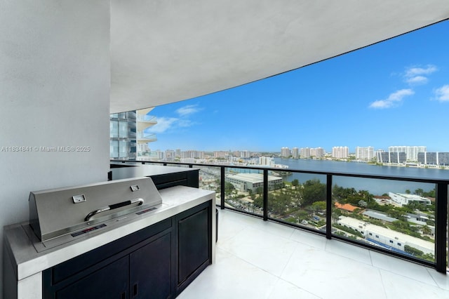 18555 Collins Ave Unit 2003, Sunny Isles Beach, FL 33160 - balcony with a city view, exterior kitchen, and a water view