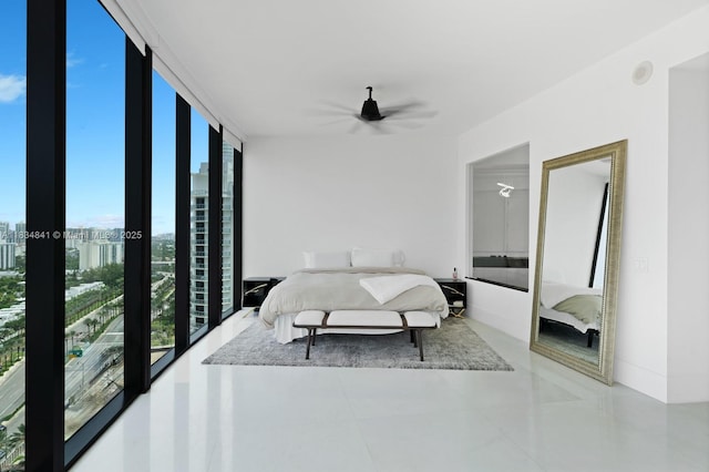 18555 Collins Ave Unit 2003, Sunny Isles Beach, FL 33160 - bedroom featuring ceiling fan and floor to ceiling windows