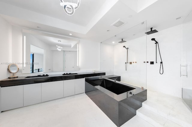 18555 Collins Ave Unit 2003, Sunny Isles Beach, FL 33160 - bathroom featuring walk in shower, vanity, and recessed lighting