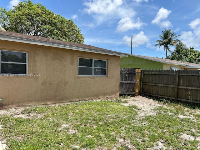 4021 NW 7th Ave, Deerfield Beach, FL 33064 - view of home's exterior featuring stucco siding
