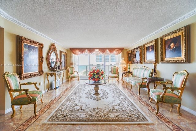 2751 S Ocean Dr Unit 1707S, Hollywood, FL 33019 - living area with a textured ceiling, inlaid floor details, and ornamental molding