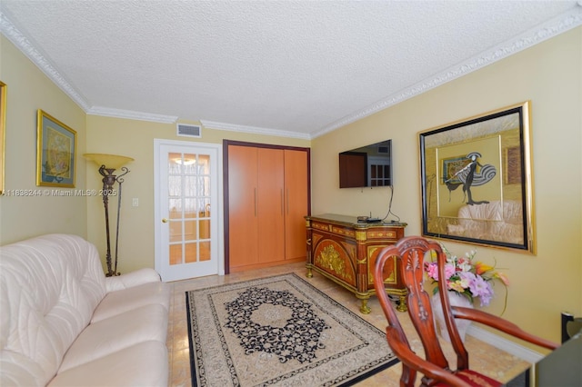 2751 S Ocean Dr Unit 1707S, Hollywood, FL 33019 - living room featuring a textured ceiling and crown molding