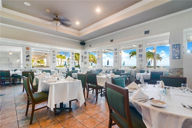 2751 S Ocean Dr Unit 1707S, Hollywood, FL 33019 - tiled dining room with a ceiling fan, recessed lighting, crown molding, and a tray ceiling