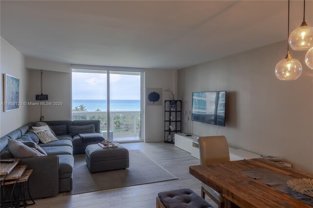 10275 Collins Ave Unit 634, Bal Harbour, FL 33154 - living room with wood finished floors and expansive windows