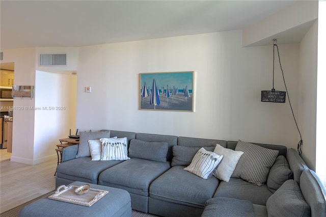 10275 Collins Ave Unit 634, Bal Harbour, FL 33154 - living area with light wood-style floors and baseboards