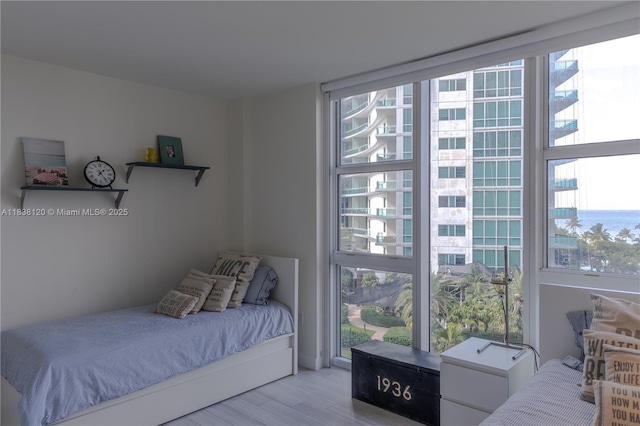 10275 Collins Ave Unit 634, Bal Harbour, FL 33154 - bedroom featuring wood finished floors