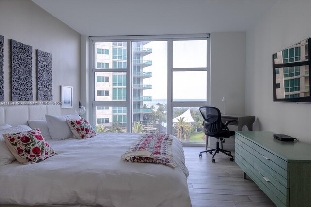 10275 Collins Ave Unit 634, Bal Harbour, FL 33154 - bedroom with wood finished floors