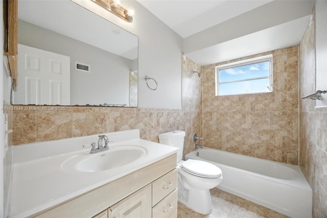 9540 NW 25th St, Sunrise, FL 33322 - full bath featuring tile walls, vanity, washtub / shower combination, and tile patterned flooring