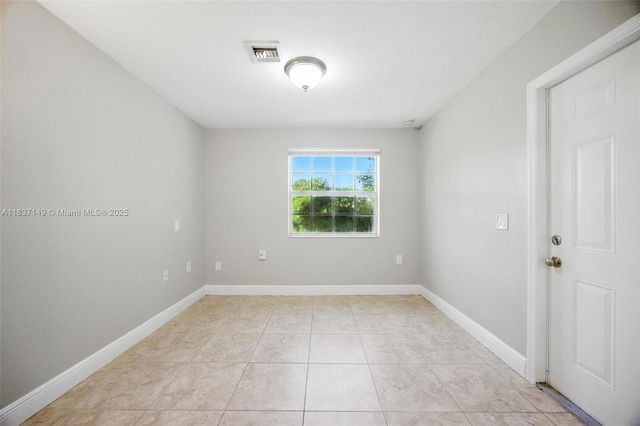 9540 NW 25th St, Sunrise, FL 33322 - unfurnished room with light tile patterned flooring and baseboards