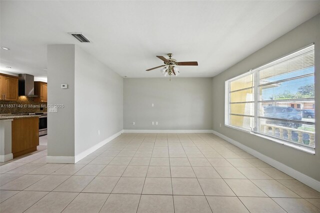 9540 NW 25th St, Sunrise, FL 33322 - empty room with ceiling fan, light tile patterned floors, and recessed lighting