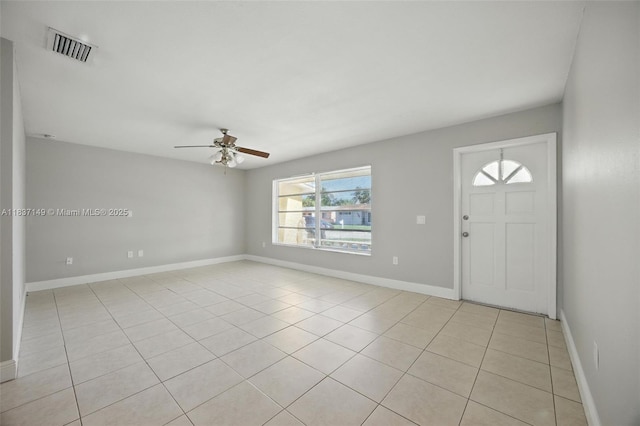 9540 NW 25th St, Sunrise, FL 33322 - entrance foyer featuring a ceiling fan and light tile patterned flooring