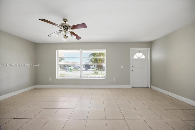 9540 NW 25th St, Sunrise, FL 33322 - foyer entrance with ceiling fan and light tile patterned floors