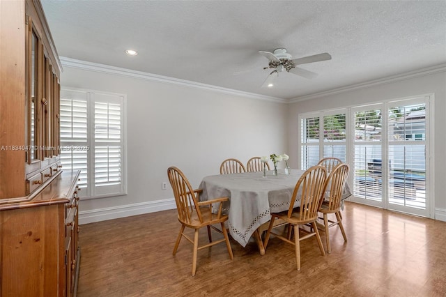 4125 SW 152nd Ave, Miramar, FL 33027 - dining area featuring wood finished floors, a ceiling fan, ornamental molding, and recessed lighting