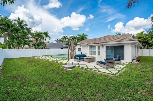 4125 SW 152nd Ave, Miramar, FL 33027 - back of house with an outdoor living space, a patio area, stucco siding, and a fenced backyard