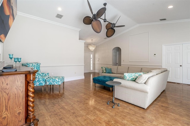 4125 SW 152nd Ave, Miramar, FL 33027 - living area with a ceiling fan, ornamental molding, wood finished floors, lofted ceiling, and arched walkways