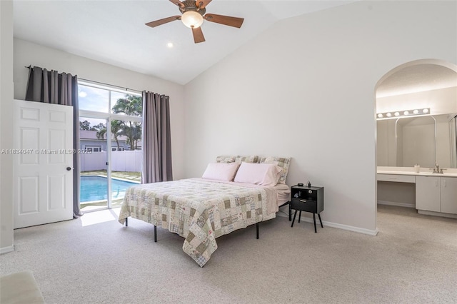 4125 SW 152nd Ave, Miramar, FL 33027 - bedroom featuring access to outside, light carpet, lofted ceiling, connected bathroom, and arched walkways