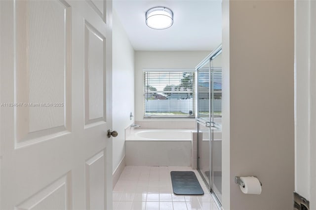 4125 SW 152nd Ave, Miramar, FL 33027 - bathroom with a garden tub, tile patterned flooring, and a shower stall
