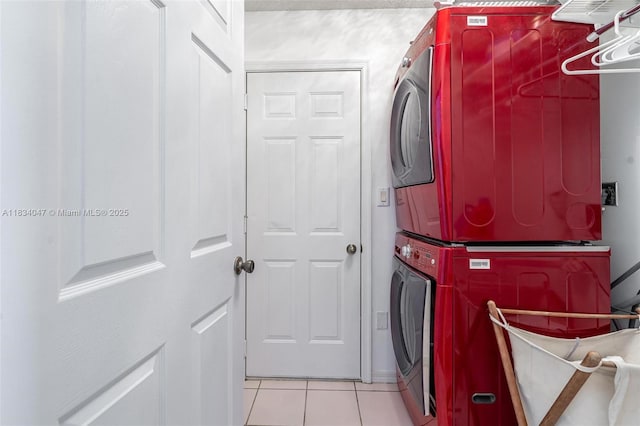 4125 SW 152nd Ave, Miramar, FL 33027 - laundry area featuring estacked washer and dryer and light tile patterned flooring