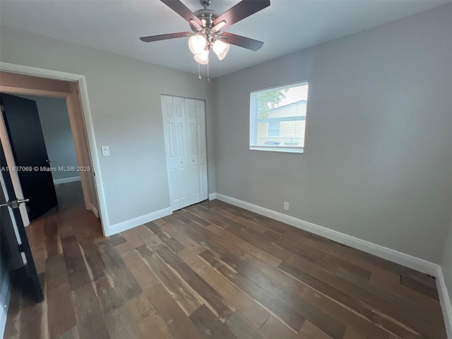 2569 NW 61st Ave, Margate, FL 33063 - unfurnished bedroom featuring dark wood finished floors, a closet, and ceiling fan