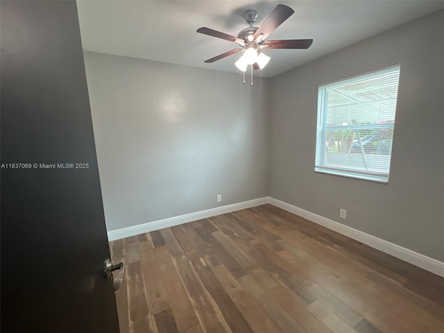2569 NW 61st Ave, Margate, FL 33063 - empty room with wood finished floors and a ceiling fan
