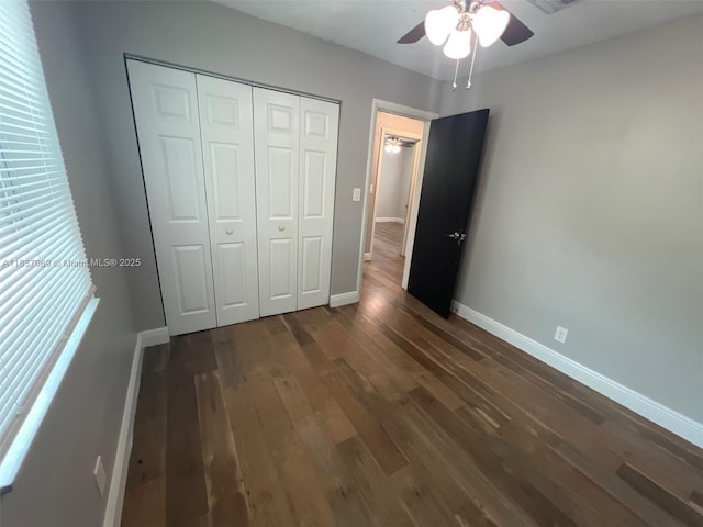 2569 NW 61st Ave, Margate, FL 33063 - unfurnished bedroom with a closet, wood finished floors, and a ceiling fan