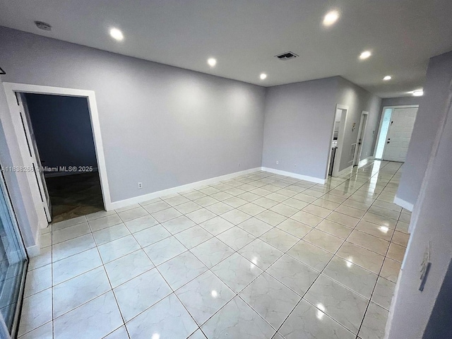 10824 Fillmore Dr, Boynton Beach, FL 33437 - spare room with recessed lighting and light tile patterned flooring