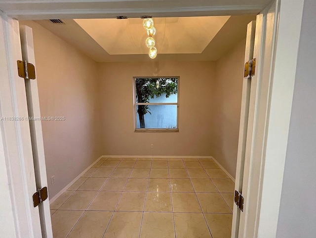 10824 Fillmore Dr, Boynton Beach, FL 33437 - unfurnished room with light tile patterned floors and baseboards