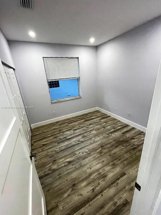 10824 Fillmore Dr, Boynton Beach, FL 33437 - unfurnished bedroom with wood finished floors and recessed lighting