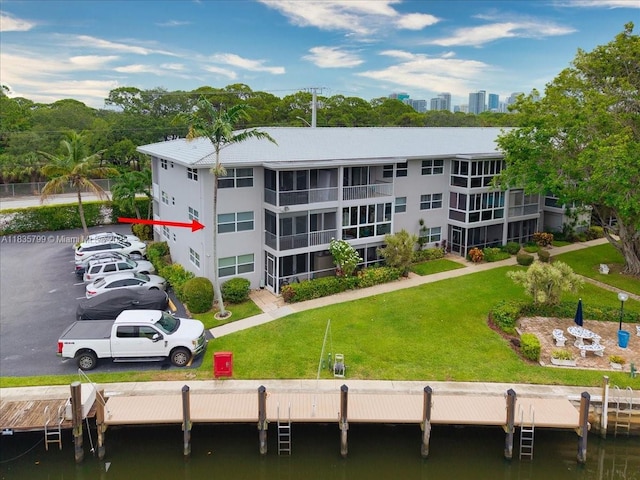 1200 SW 12th St Unit 214, Fort Lauderdale, FL 33315 - view of building exterior with a water view