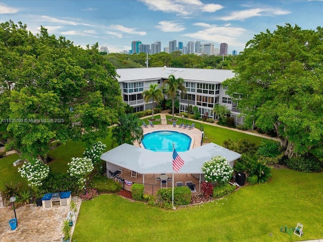 1200 SW 12th St Unit 214, Fort Lauderdale, FL 33315 - view of swimming pool featuring a view of skyline and a yard