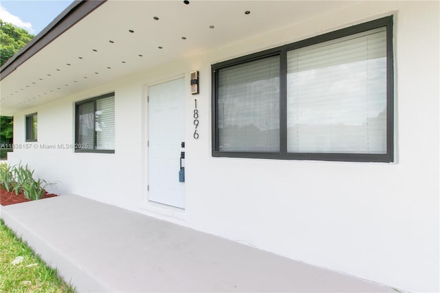 1896 NW 66th St, Miami, FL 33147 - entrance to property with stucco siding