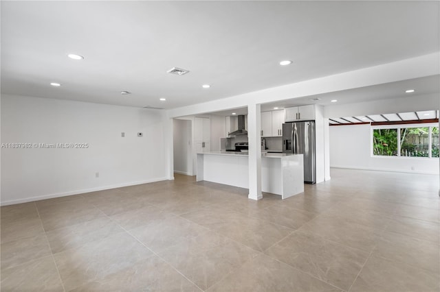 1710 SW 1st Ave, Pompano Beach, FL 33060 - unfurnished living room featuring recessed lighting and light tile patterned floors