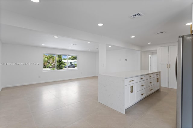 1710 SW 1st Ave, Pompano Beach, FL 33060 - spare room with recessed lighting and light tile patterned flooring