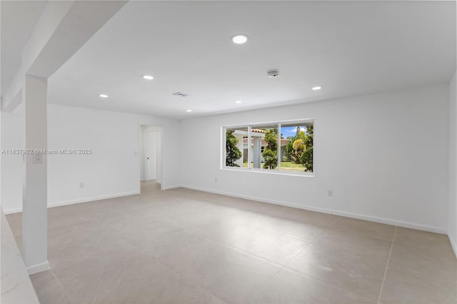 1710 SW 1st Ave, Pompano Beach, FL 33060 - unfurnished room with recessed lighting, light tile patterned floors, and a smoke detector
